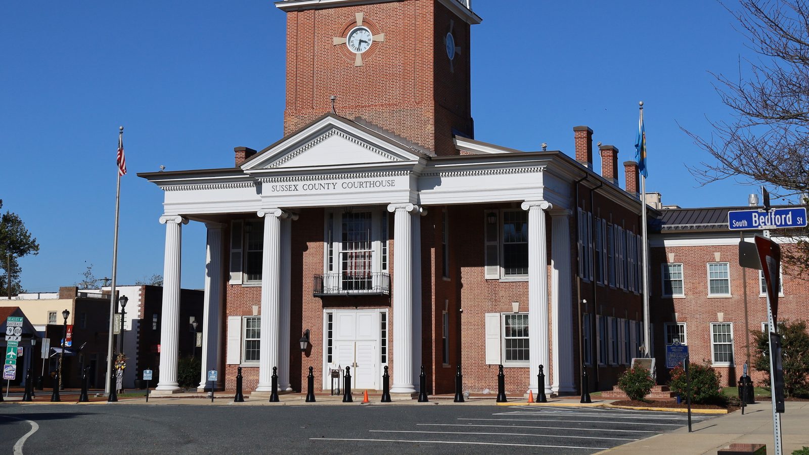 Sussex County Courthouse in Georgetown, a brick building with white columns and a clock tower